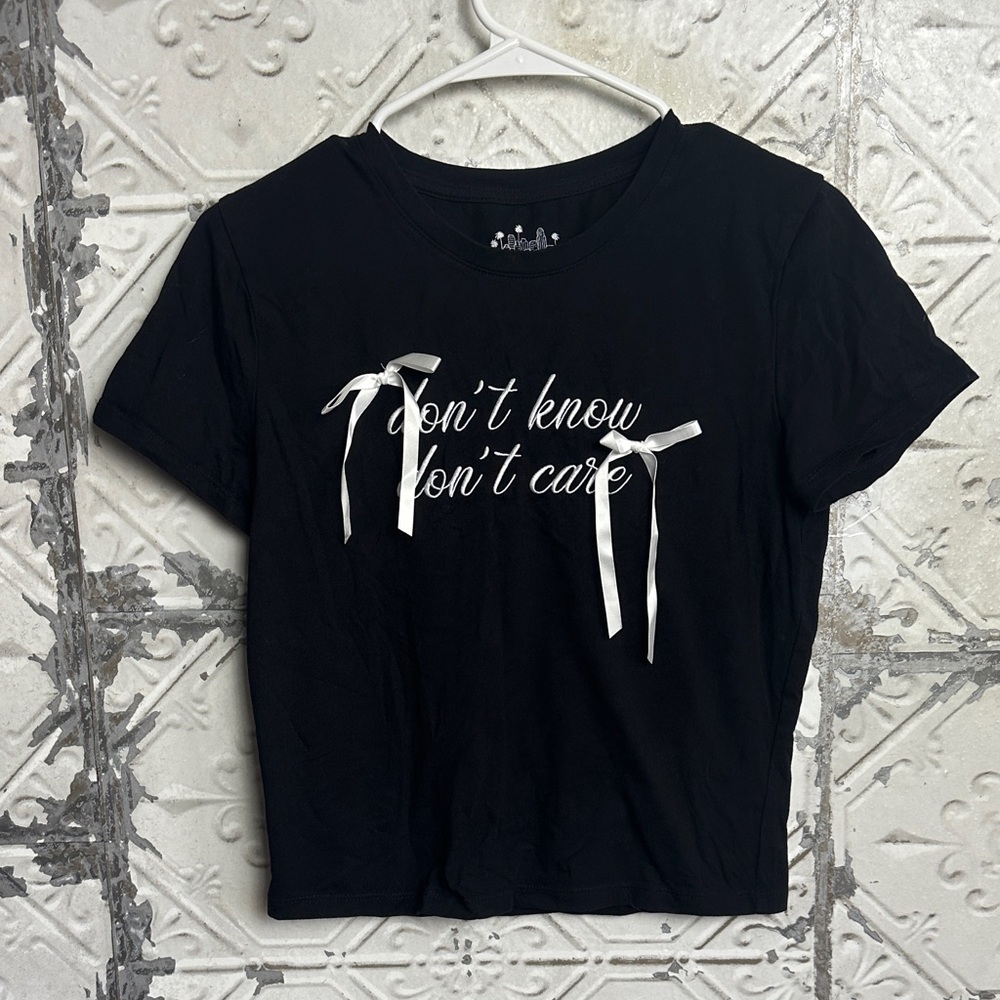 Sassy don’t know don’t care bow crop coquette tee